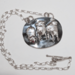 3 Sheep pendant necklace, a hand raised design with toggle clasp