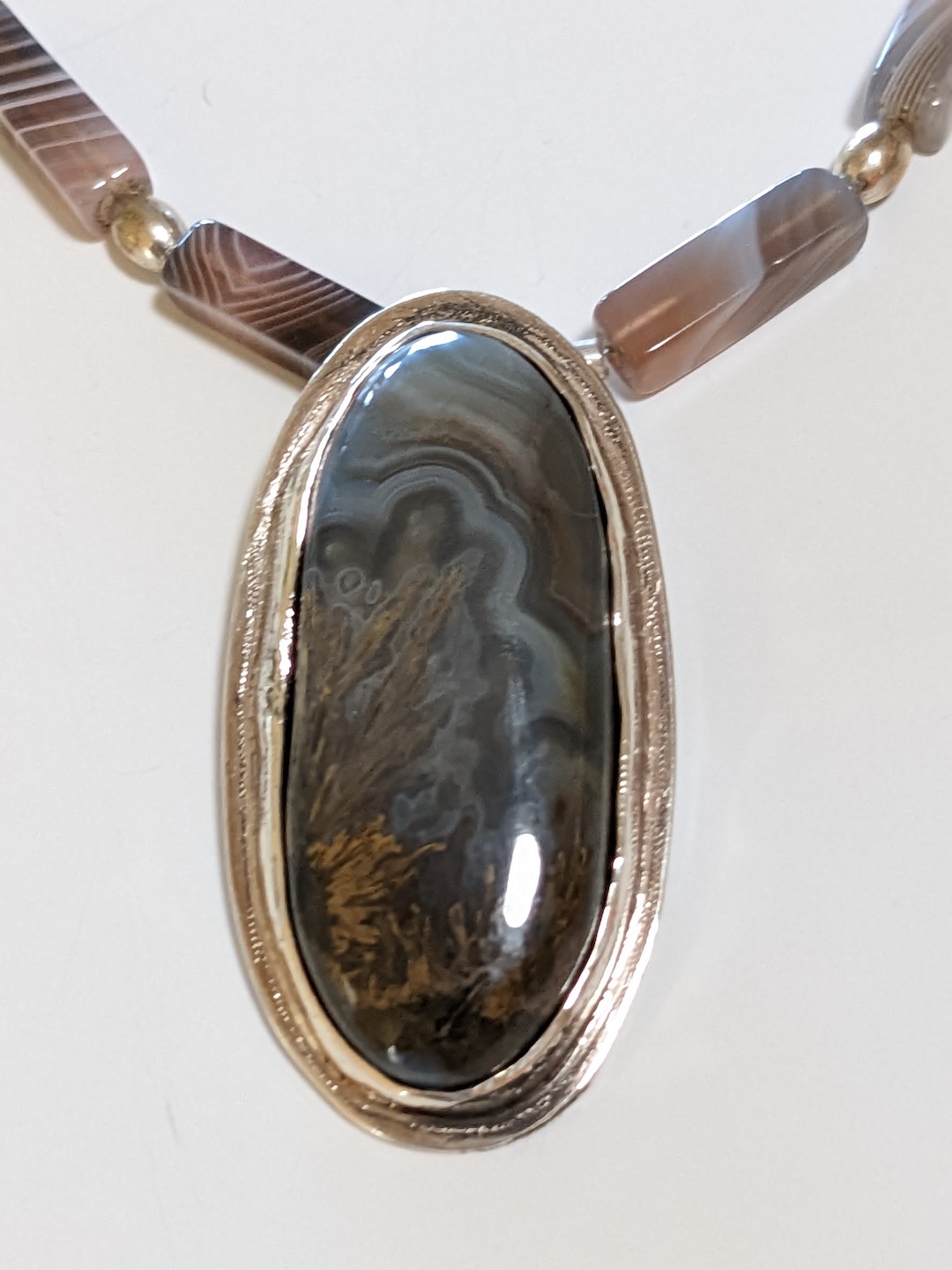 Oval Plume Agate Pendant Necklace, gray and black set in sterling silver